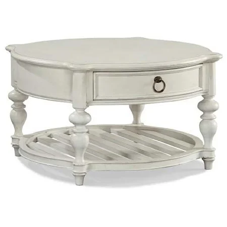 Round Cocktail Table with Scalloped Edge and Turned Pedestal Legs